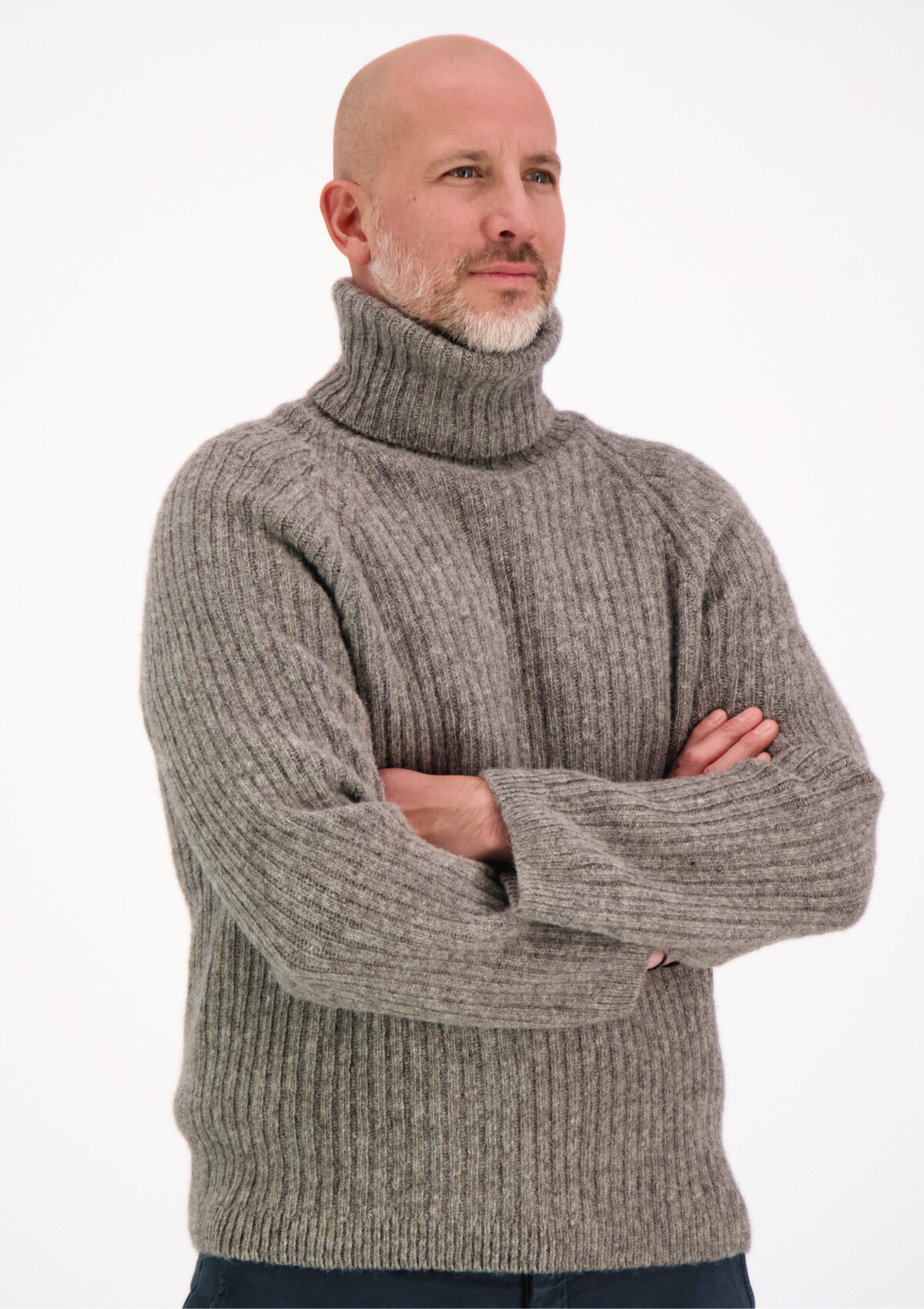 Ribbed grey polo made from Finnish durable sheep wool. Sustainable and warm wool knit made in Finland.