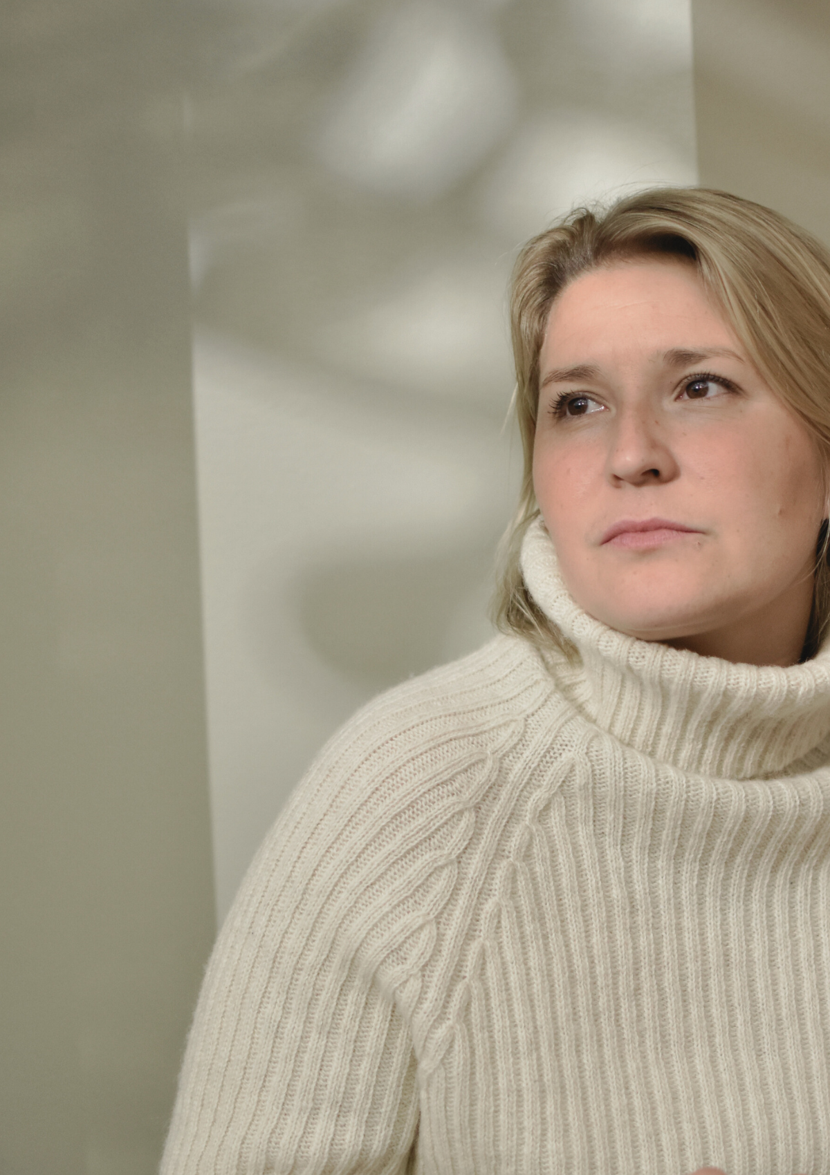 Ribbed white polo made from Finnish durable sheep wool. Sustainable and warm wool knit made in Finland.