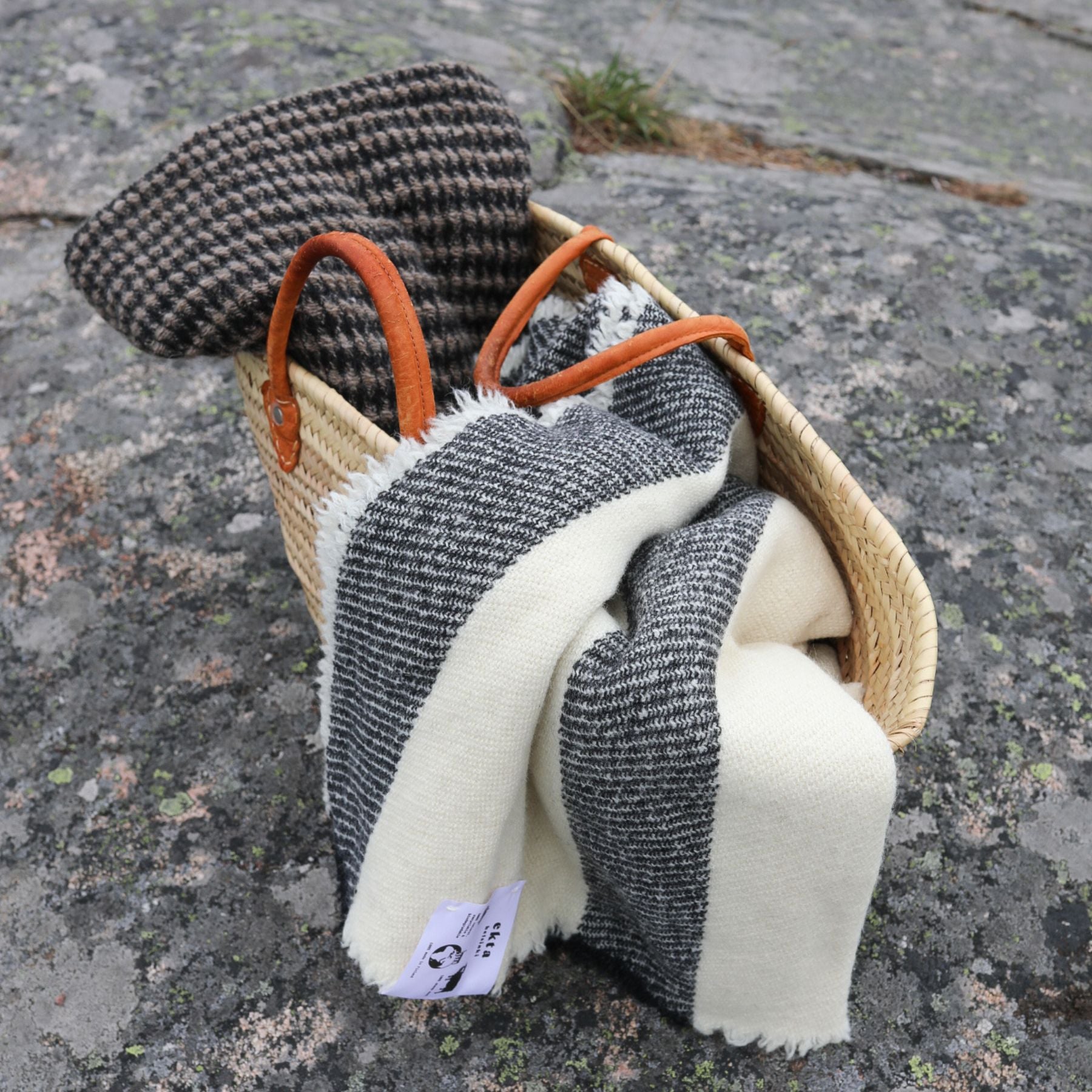 Beige and black colored goose eye patterned wool shawl made from Finnish sheep wool and manufactured in Finland.
