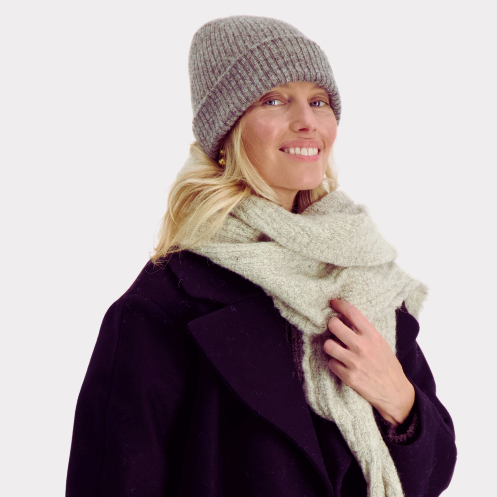 Grey thin ribbed beanie made from responsible Finnish sheep wool. Manufactured in Finland.