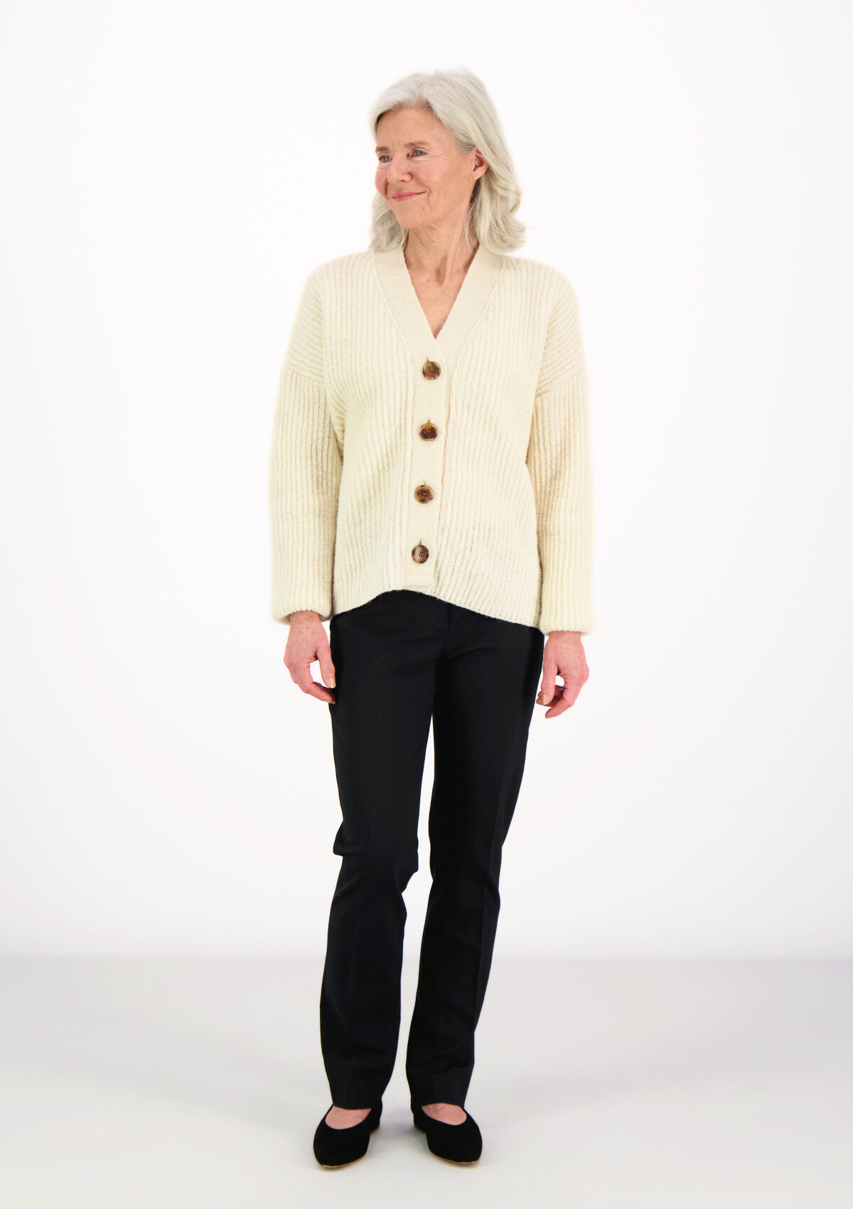 White ribbed cardigan made in Finland from Finnish sheep wool. Sustainable and ethical.