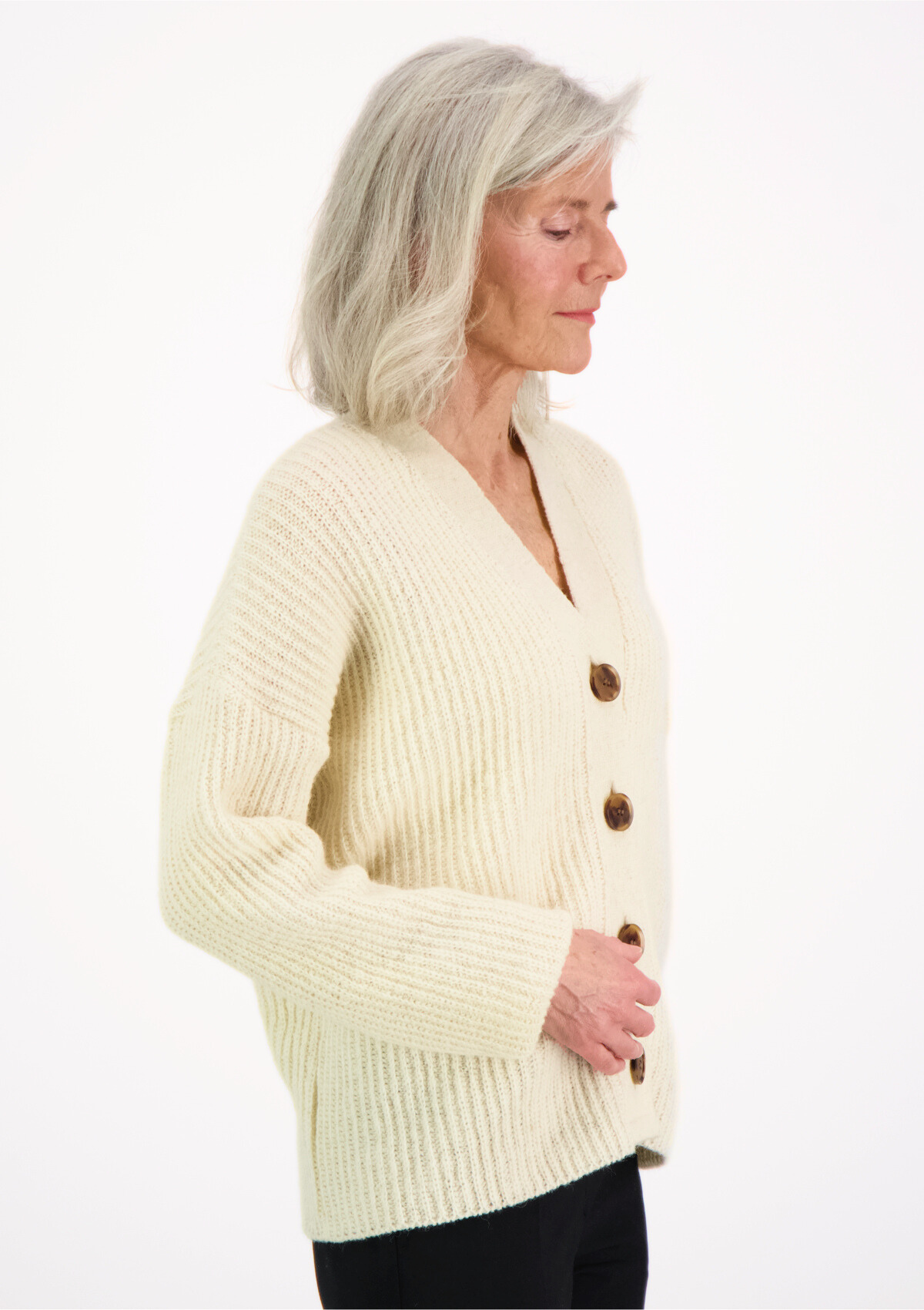 White ribbed cardigan made in Finland from Finnish sheep wool. Sustainable and ethical.