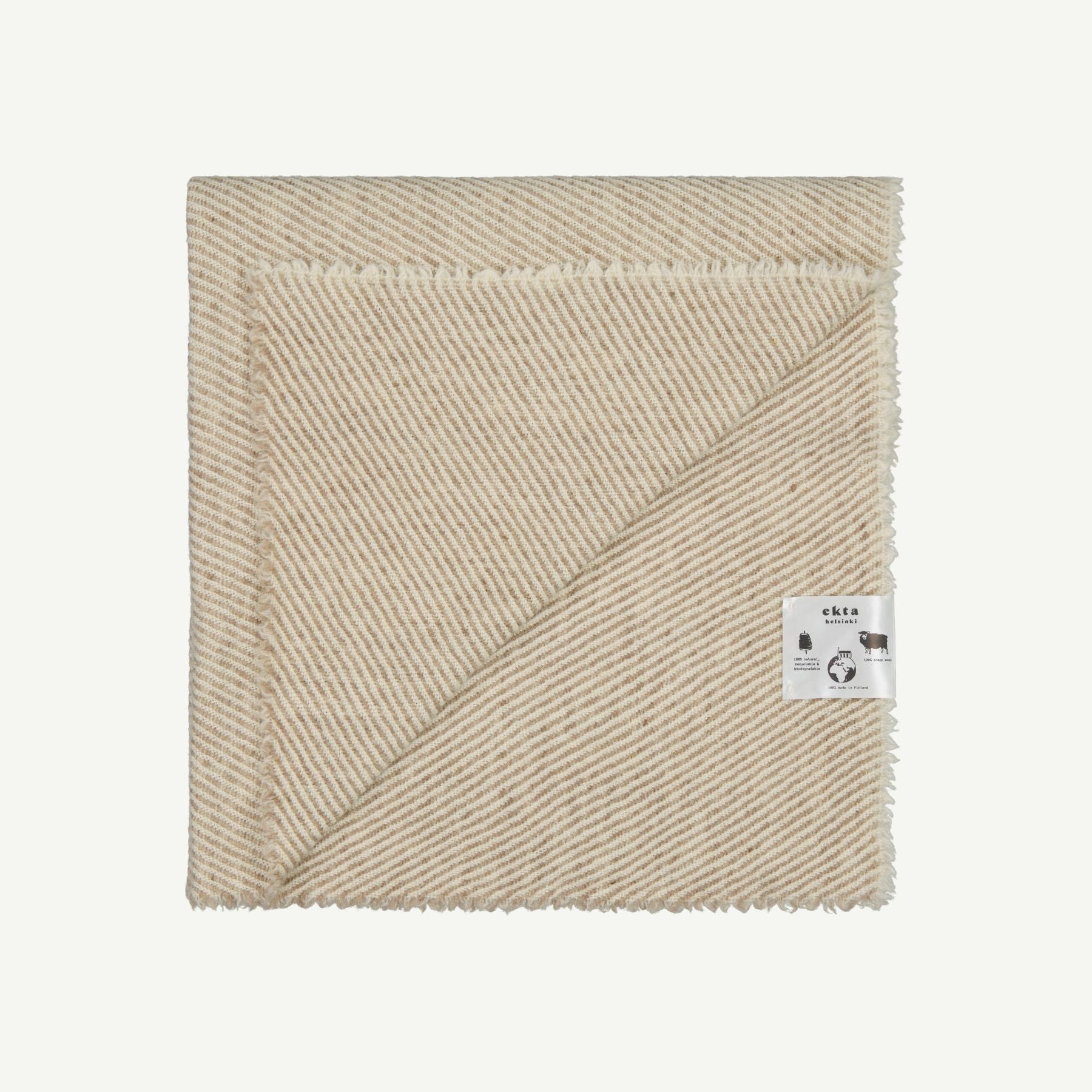 Diagonal striped wool blanket for babies or dogs, made from 100% Finnish wool.