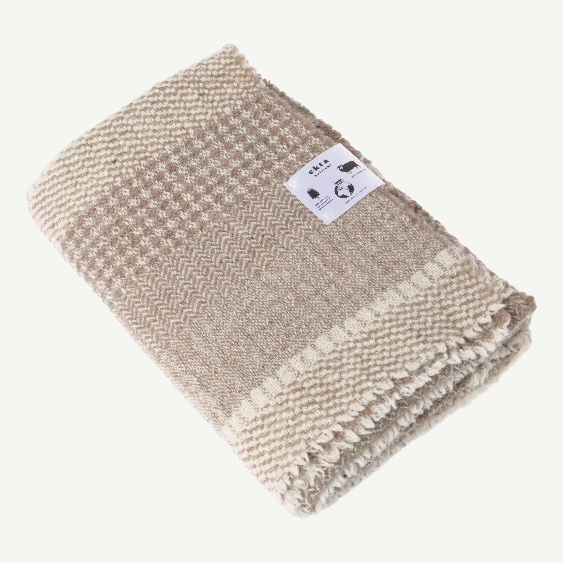 Textured Finnish wool blanket from Ekta Helsinki beige and white. Manufactured responsibly in Finland. Use for outside or inside both summer and winter.