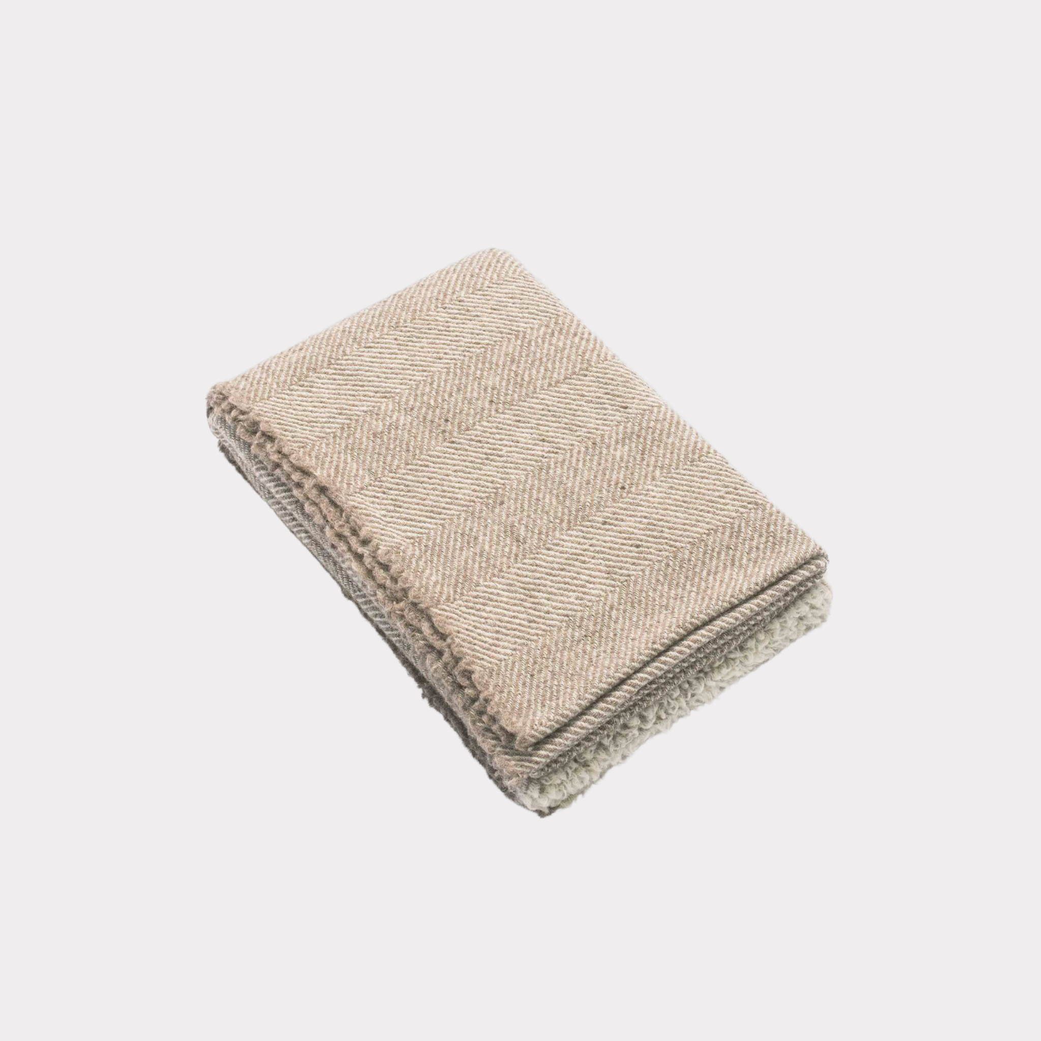 Beige and white herringbone wool throw woven from 100% Finnish sheep wool