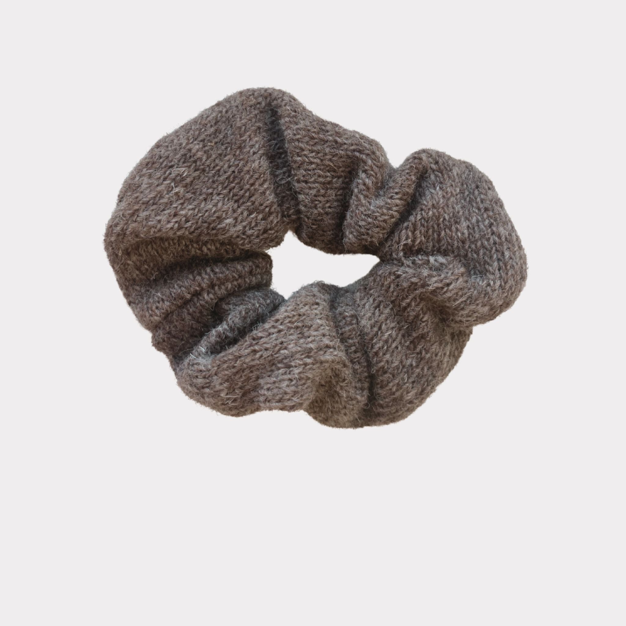 Ekta Helsinki wool scrunchies are gentle and warm for the hair and head. Made in Helsinki, material Finnish sheep wool. Come in beige and brown and large and smaller size. 