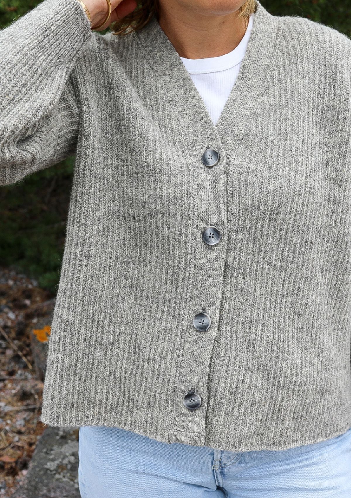 Mid grey v-neck cardigan made in Finland from local sheep wool.