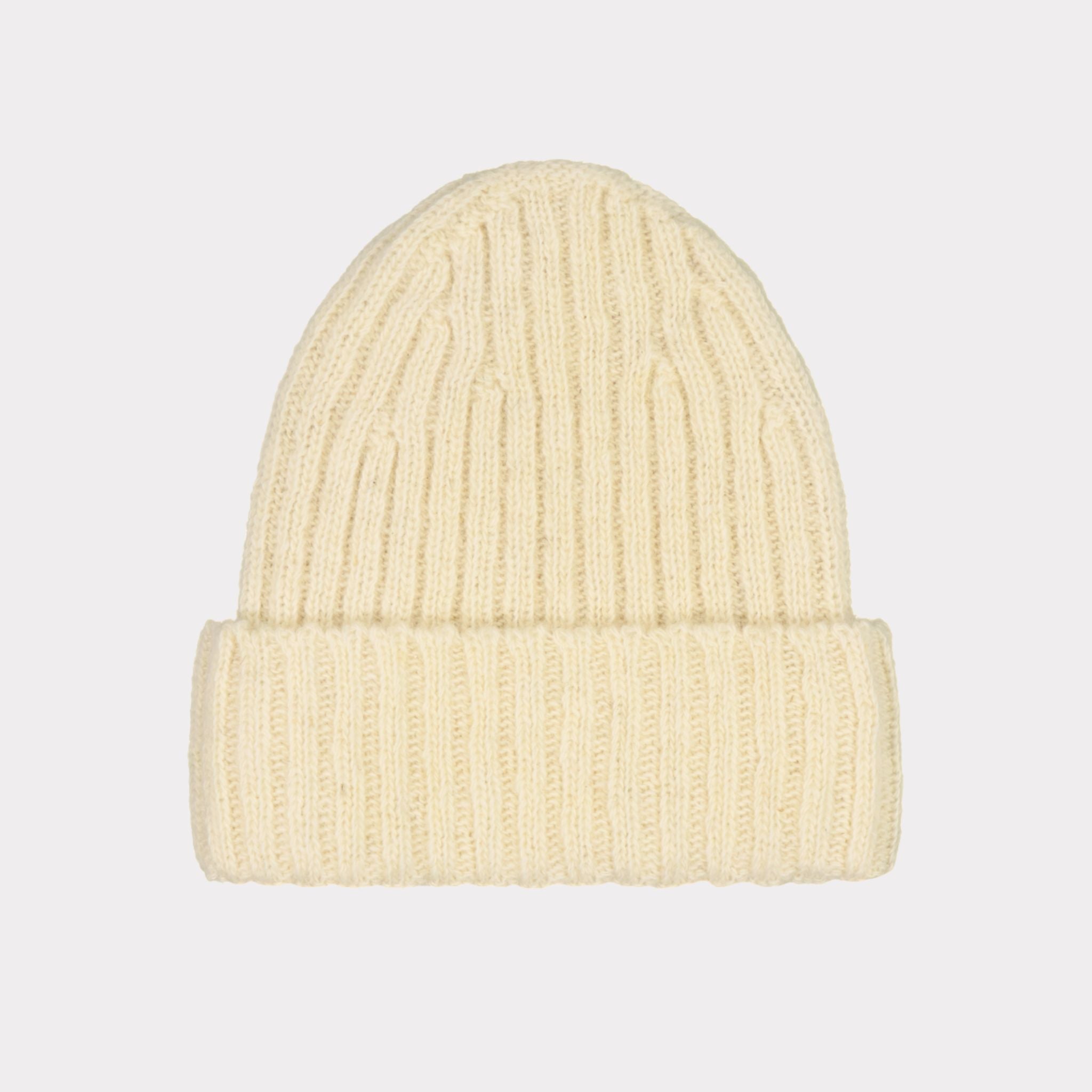 A classic beanie made from premium Finnish sheep wool. Warm, breathable, lightweight, and rib-knitted with a fold-up design for timeless comfort.