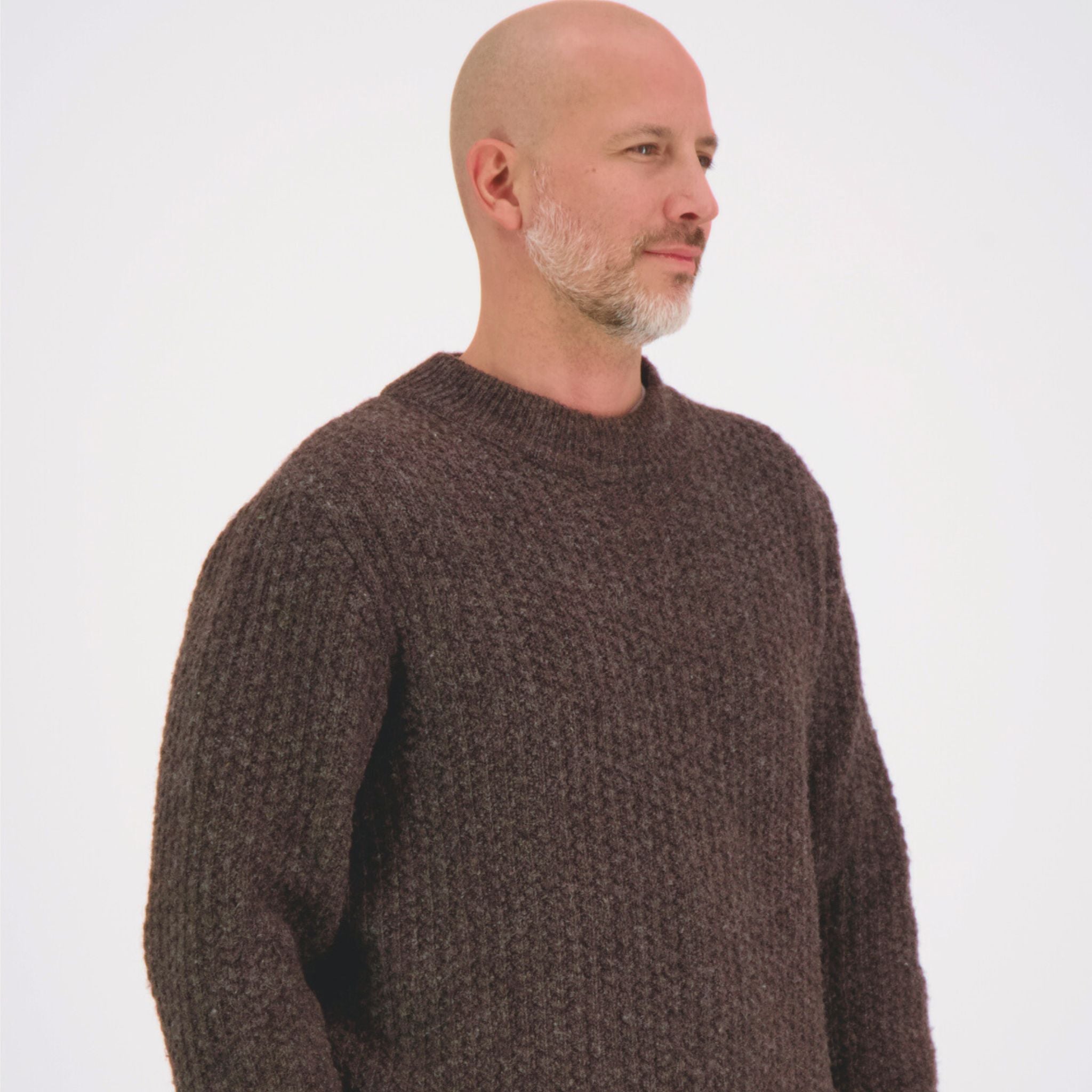 O-neck brown knit crafted from ethically sourced sheep wool in Finland