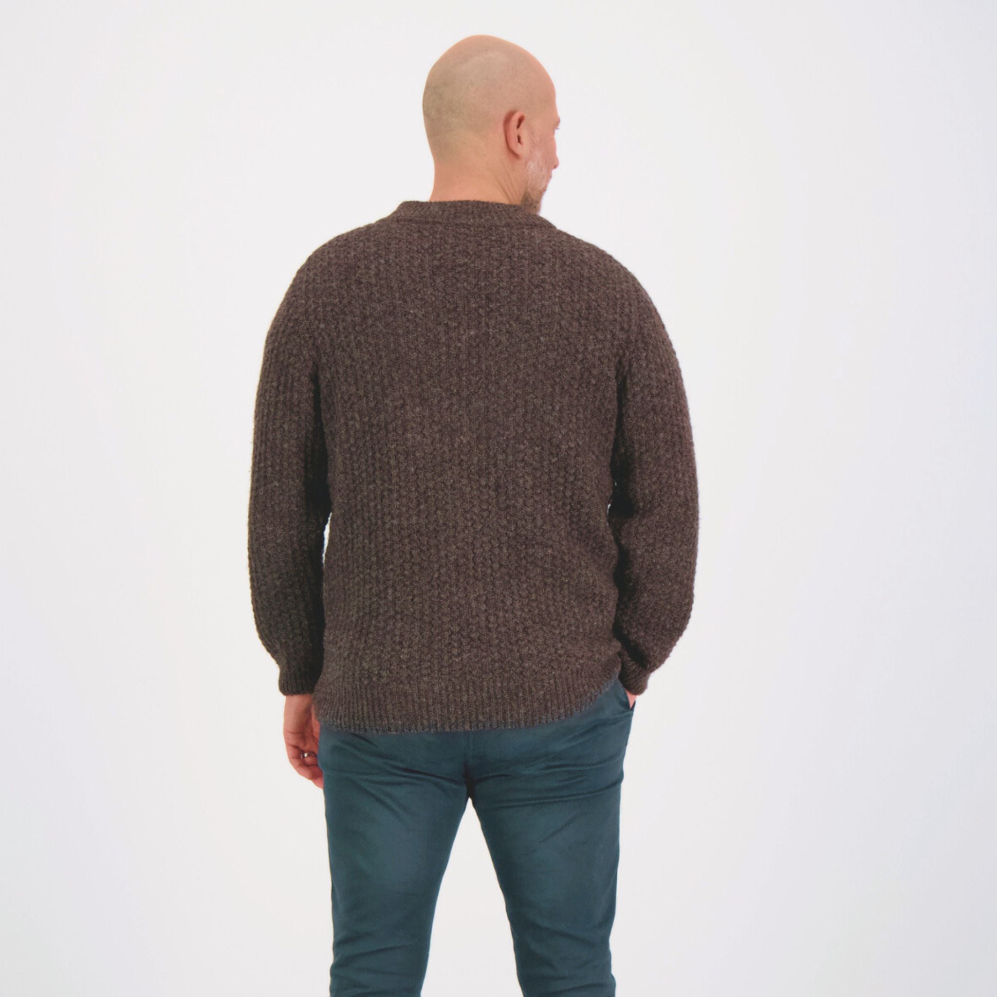 O-neck brown knit crafted from ethically sourced sheep wool in Finland.