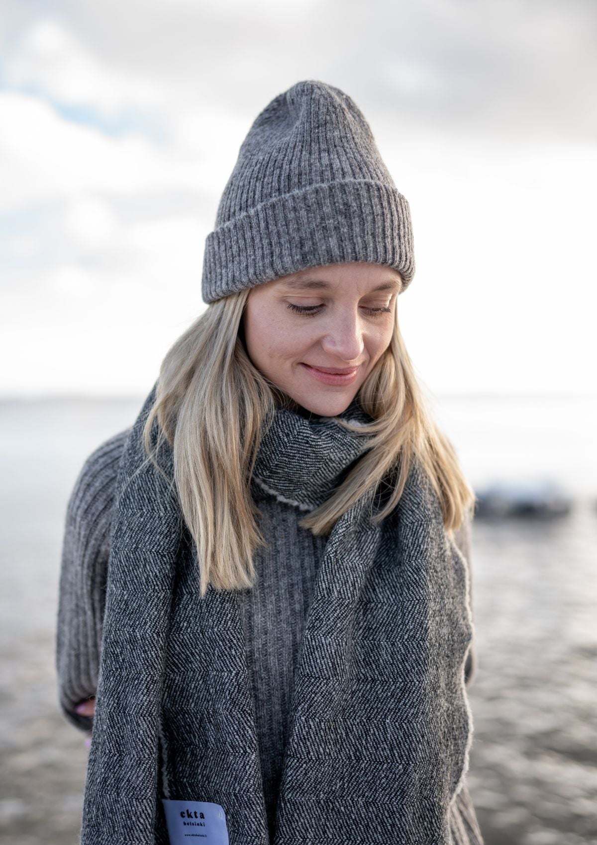 Grey thin ribbed beanie made from responsible Finnish sheep wool. Manufactured in Finland. 